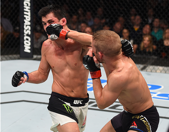 BOSTON, MA - JANUARY 17: (R-L) TJ Dillashaw punches Dominick Cruz in their UFC bantamweight championship bout during the UFC Fight Night event inside TD Garden on January 17, 2016 in Boston, Massachusetts. (Photo by Jeff Bottari/Zuffa LLC/Zuffa LLC via G