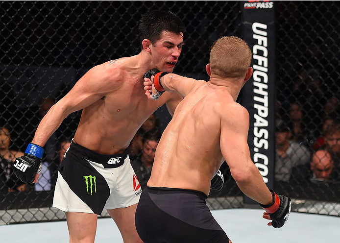 BOSTON, MA - JANUARY 17: (R-L) TJ Dillashaw punches Dominick Cruz in their UFC bantamweight championship bout during the UFC Fight Night event inside TD Garden on January 17, 2016 in Boston, Massachusetts. (Photo by Jeff Bottari/Zuffa LLC/Zuffa LLC via G