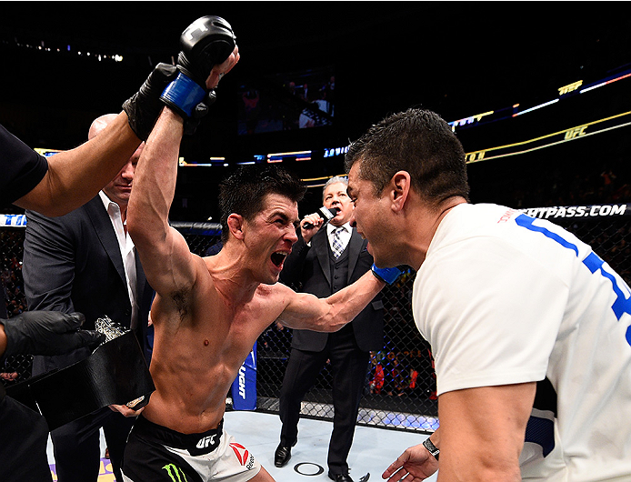 BOSTON, MA - JANUARY 17: Dominick Cruz celebrates his split-decision victory over TJ Dillashaw in their UFC bantamweight championship bout during the UFC Fight Night event inside TD Garden on January 17, 2016 in Boston, Massachusetts. (Photo by Jeff Bott