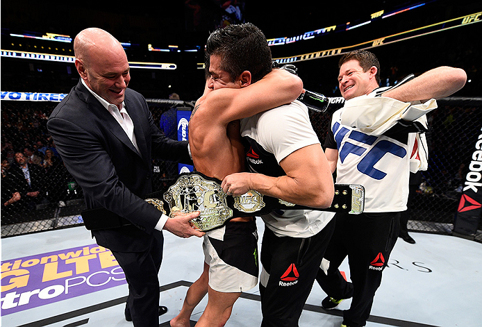 BOSTON, MA - JANUARY 17: Dominick Cruz celebrates his split-decision victory over TJ Dillashaw in their UFC bantamweight championship bout during the UFC Fight Night event inside TD Garden on January 17, 2016 in Boston, Massachusetts. (Photo by Jeff Bott