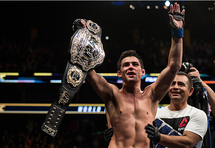 BOSTON, MA - JANUARY 17: Dominick Cruz celebrates his victory over TJ Dillashaw in their UFC bantamweight championship bout during the UFC Fight Night event inside TD Garden on January 17, 2016 in Boston, Massachusetts. (Photo by Brandon Magnus/Zuffa LLC