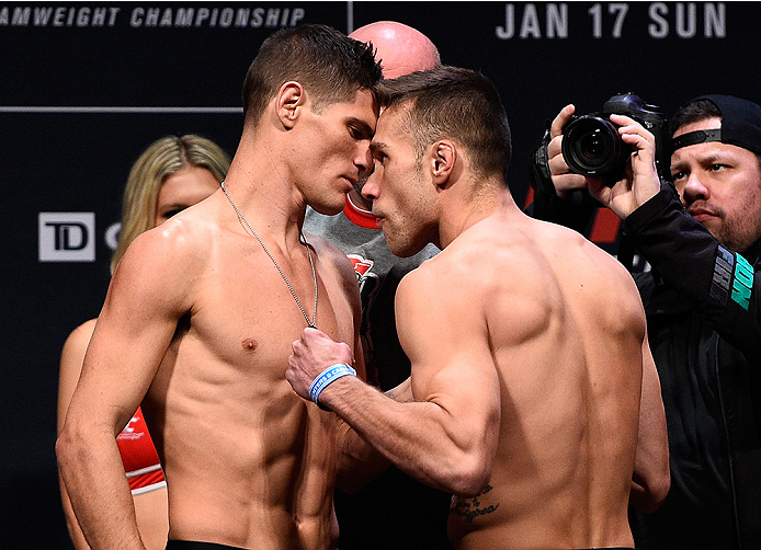 BOSTON, MA - JANUARY 16: (L-R) Opponents Charles Rosa and Kyle Bochniak face off during the UFC weigh-in at the Wang Theatre on January 16, 2016 in Boston, Massachusetts. (Photo by Jeff Bottari/Zuffa LLC/Zuffa LLC via Getty Images)
