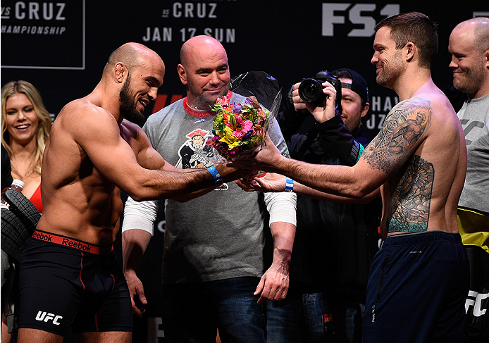 BOSTON, MA - JANUARY 16: (R-L) Sean OConnell presents a bouquet to opponent Ilir Latifi of Sweden during the UFC weigh-in at the Wang Theatre on January 16, 2016 in Boston, Massachusetts. (Photo by Jeff Bottari/Zuffa LLC/Zuffa LLC via Getty Images)