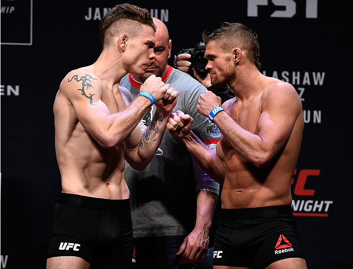 BOSTON, MA - JANUARY 16: (L-R) Opponents Paul Felder and Daron Cruickshank face off during the UFC weigh-in at the Wang Theatre on January 16, 2016 in Boston, Massachusetts. (Photo by Jeff Bottari/Zuffa LLC/Zuffa LLC via Getty Images)