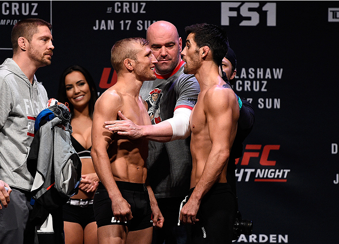 BOSTON, MA - JANUARY 16: (L-R) Opponents TJ Dillashaw and Dominick Cruz face off during the UFC weigh-in at the Wang Theatre on January 16, 2016 in Boston, Massachusetts. (Photo by Jeff Bottari/Zuffa LLC/Zuffa LLC via Getty Images)
