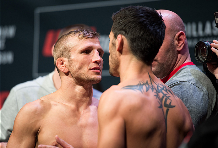 BOSTON, MA - JANUARY 16: (L-R) UFC bantamweight champion TJ Dillashaw and Dominick Cruz face off during the UFC Fight Night Boston weigh-in inside Wang Theater on January 16, 2016 in Boston, Massachusetts. (Photo by Brandon Magnus/Zuffa LLC/Zuffa LLC v
