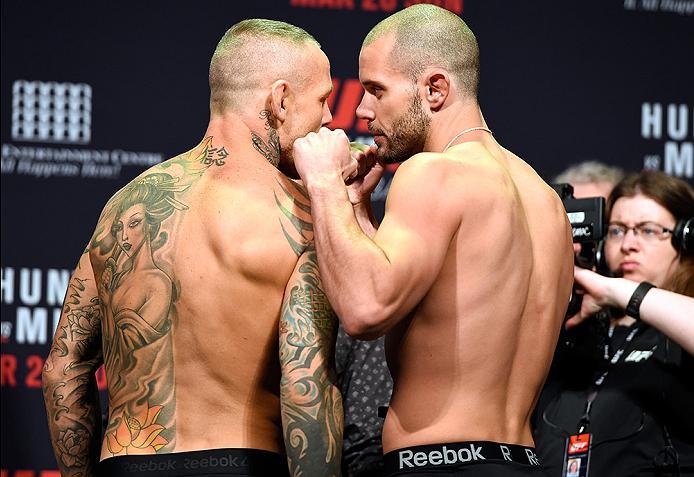 BRISBANE, AUSTRALIA - MARCH 19: (L-R) Opponents Ross Pearson of England and Chad Laprise of Canada face off during the UFC Fight Night weigh-in at the Brisbane Entertainment Centre on March 19, 2016 in Brisbane, Australia. (Photo by Josh Hedges/Zuffa LLC