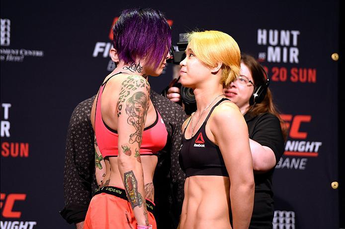 BRISBANE, AUSTRALIA - MARCH 19: (L-R) Opponents Bec Rawlings of Australia and Seohee Ham of South Korea face off during the UFC Fight Night weigh-in at the Brisbane Entertainment Centre on March 19, 2016 in Brisbane, Australia. (Photo by Josh Hedges/Zuff