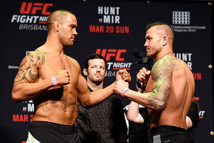 BRISBANE, AUSTRALIA - MARCH 19: (L-R) Opponents James Te Huna of New Zealand and Steve Bosse of Canada face off during the UFC Fight Night weigh-in at the Brisbane Entertainment Centre on March 19, 2016 in Brisbane, Australia. (Photo by Josh Hedges/Zuffa