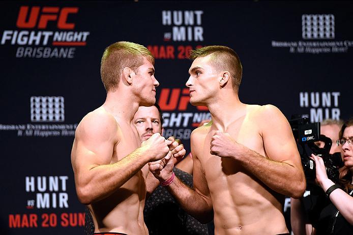 BRISBANE, AUSTRALIA - MARCH 19: (L-R) Opponents Jake Matthews of Australia and Johnny Case face off during the UFC Fight Night weigh-in at the Brisbane Entertainment Centre on March 19, 2016 in Brisbane, Australia. (Photo by Josh Hedges/Zuffa LLC/Zuffa