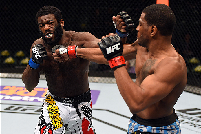 FAIRFAX, VA - APRIL 04: (R-L) Ron Stallings punches Justin Jones in their middleweight fight during the UFC Fight Night event at the Patriot Center on April 4, 2015 in Fairfax, Virginia. (Photo by Josh Hedges/Zuffa LLC/Zuffa LLC via Getty Images)