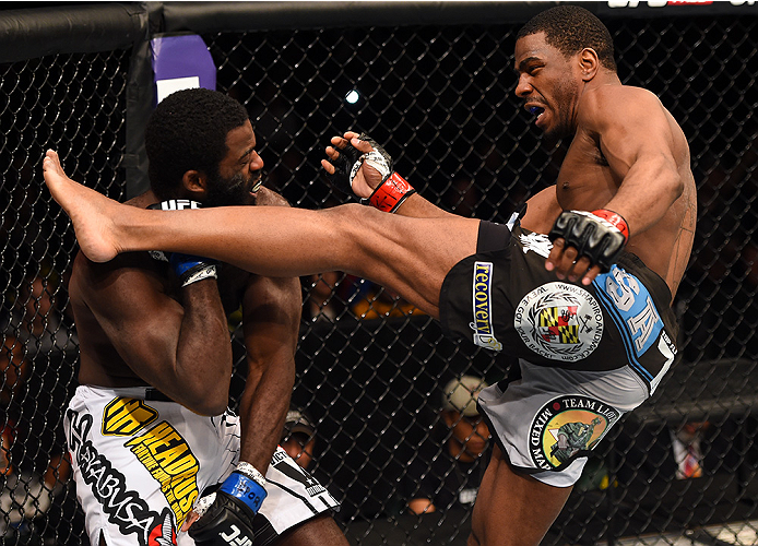 FAIRFAX, VA - APRIL 04: (R-L) Ron Stallings kicks Justin Jones in their middleweight fight during the UFC Fight Night event at the Patriot Center on April 4, 2015 in Fairfax, Virginia. (Photo by Josh Hedges/Zuffa LLC/Zuffa LLC via Getty Images)