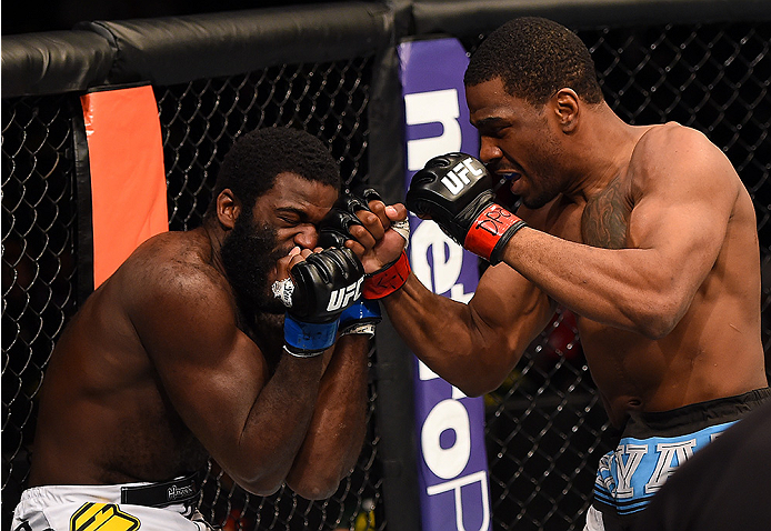 FAIRFAX, VA - APRIL 04: (R-L) Ron Stallings punches Justin Jones in their middleweight fight during the UFC Fight Night event at the Patriot Center on April 4, 2015 in Fairfax, Virginia. (Photo by Josh Hedges/Zuffa LLC/Zuffa LLC via Getty Images)