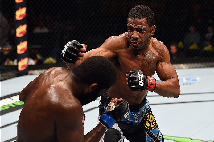 FAIRFAX, VA - APRIL 04: (R-L) Ron Stallings punches Justin Jones in their middleweight fight during the UFC Fight Night event at the Patriot Center on April 4, 2015 in Fairfax, Virginia. (Photo by Josh Hedges/Zuffa LLC/Zuffa LLC via Getty Images)