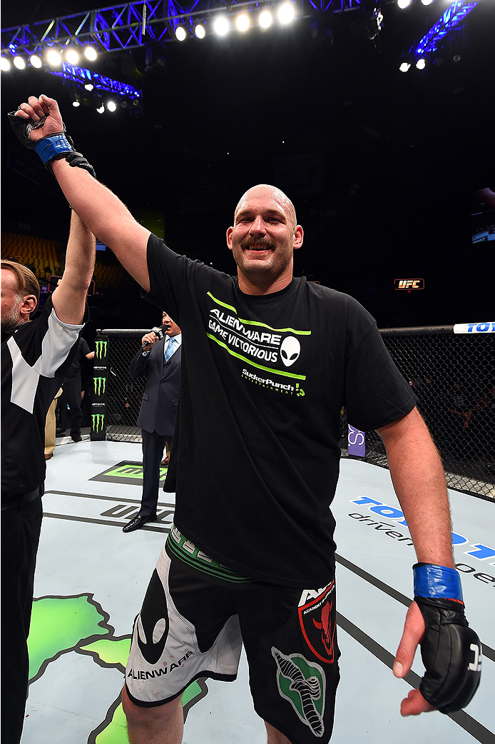 FAIRFAX, VA - APRIL 04: Timothy Johnson celebrates after defeating Shamil Abdurakhimov of Russia in their heavyweight fight during the UFC Fight Night event at the Patriot Center on April 4, 2015 in Fairfax, Virginia. (Photo by Josh Hedges/Zuffa LLC/Zuff