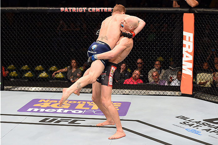 FAIRFAX, VA - APRIL 04: (R-L) Alexander Yakovlev attempts a takedown against Gray Maynard in their lightweight fight during the UFC Fight Night event at the Patriot Center on April 4, 2015 in Fairfax, Virginia. (Photo by Josh Hedges/Zuffa LLC/Zuffa LLC