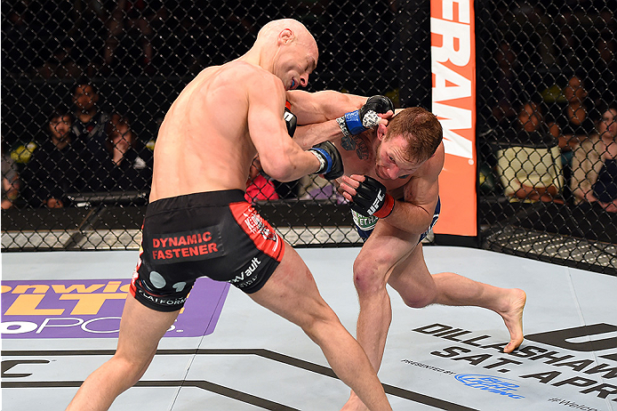 FAIRFAX, VA - APRIL 04: (R-L) Gray Maynard punches Alexander Yakovlev in their lightweight fight during the UFC Fight Night event at the Patriot Center on April 4, 2015 in Fairfax, Virginia. (Photo by Josh Hedges/Zuffa LLC/Zuffa LLC via Getty Images)