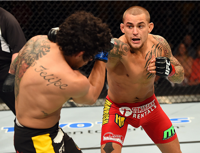 FAIRFAX, VA - APRIL 04: (R-L) Dustin Poirier punches Diego Ferreira in their lightweight fight during the UFC Fight Night event at the Patriot Center on April 4, 2015 in Fairfax, Virginia. (Photo by Josh Hedges/Zuffa LLC/Zuffa LLC via Getty Images)