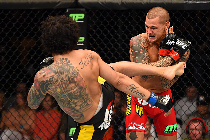 FAIRFAX, VA - APRIL 04: (L-R) Diego Ferreira kicks Dustin Poirier in their lightweight fight during the UFC Fight Night event at the Patriot Center on April 4, 2015 in Fairfax, Virginia. (Photo by Josh Hedges/Zuffa LLC/Zuffa LLC via Getty Images)