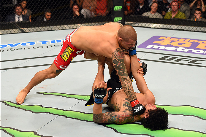 FAIRFAX, VA - APRIL 04: (L-R) Dustin Poirier punches Diego Ferreira in their lightweight fight during the UFC Fight Night event at the Patriot Center on April 4, 2015 in Fairfax, Virginia. (Photo by Josh Hedges/Zuffa LLC/Zuffa LLC via Getty Images)