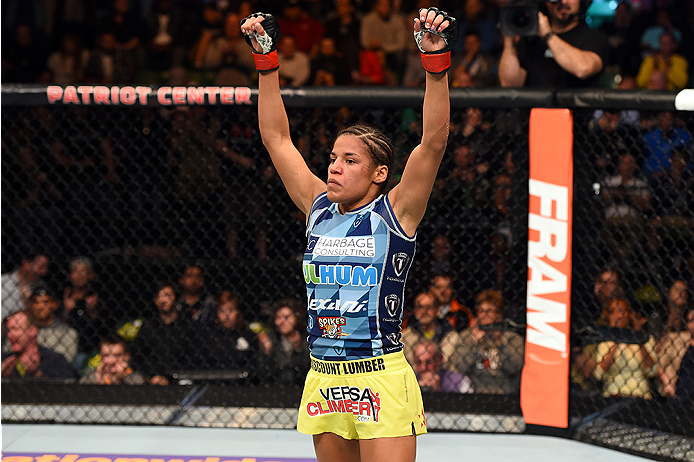 FAIRFAX, VA - APRIL 04: Juliana Pena celebrates after defeating Milana Dudieva in their women's bantamweight fight during the UFC Fight Night event at the Patriot Center on April 4, 2015 in Fairfax, Virginia. (Photo by Josh Hedges/Zuffa LLC/Zuffa LLC via