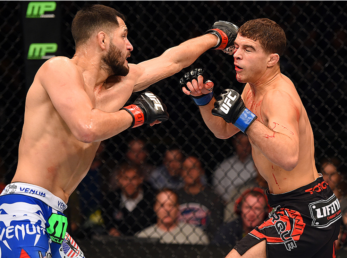FAIRFAX, VA - APRIL 04: (L-R) Jorge Masvidal punches Al Iaquinta in their lightweight fight during the UFC Fight Night event at the Patriot Center on April 4, 2015 in Fairfax, Virginia. (Photo by Josh Hedges/Zuffa LLC/Zuffa LLC via Getty Images)