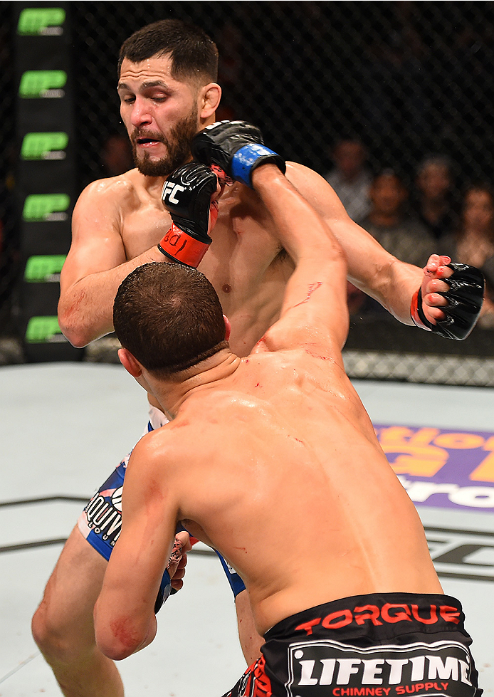 FAIRFAX, VA - APRIL 04: (R-L) Al Iaquinta punches Jorge Masvidal in their lightweight fight during the UFC Fight Night event at the Patriot Center on April 4, 2015 in Fairfax, Virginia. (Photo by Josh Hedges/Zuffa LLC/Zuffa LLC via Getty Images)