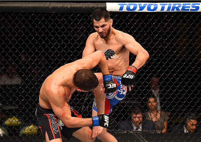 FAIRFAX, VA - APRIL 04: (R-L) Jorge Masvidal lands a knee to the head of Al Iaquinta in their lightweight fight during the UFC Fight Night event at the Patriot Center on April 4, 2015 in Fairfax, Virginia. (Photo by Josh Hedges/Zuffa LLC/Zuffa LLC via Ge