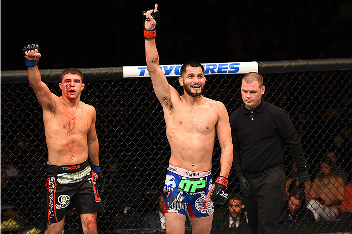 FAIRFAX, VA - APRIL 04: (R-L) Jorge Masvidal and Al Iaquinta react immediately following their lightweight fight during the UFC Fight Night event at the Patriot Center on April 4, 2015 in Fairfax, Virginia. (Photo by Josh Hedges/Zuffa LLC/Zuffa LLC via G