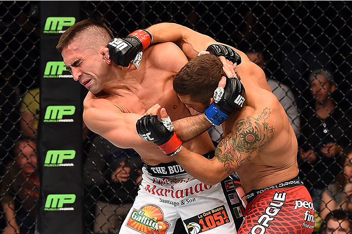 FAIRFAX, VA - APRIL 04: (R-L) Chad Mendes punches Ricardo Lamas in their featherweight fight during the UFC Fight Night event at the Patriot Center on April 4, 2015 in Fairfax, Virginia. (Photo by Josh Hedges/Zuffa LLC/Zuffa LLC via Getty Images)