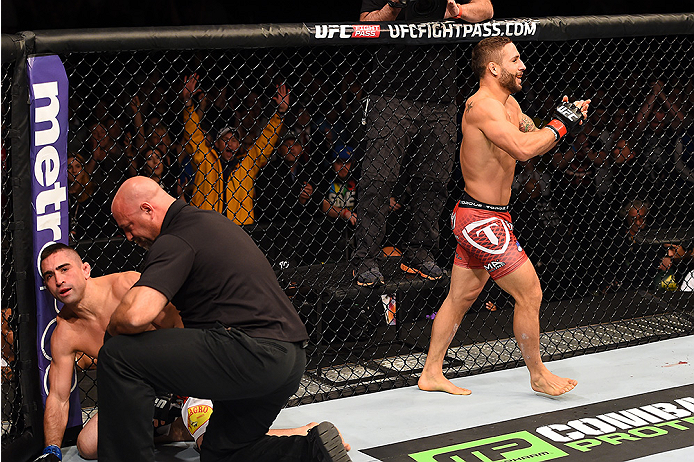 FAIRFAX, VA - APRIL 04: (R-L) Chad Mendes celebrates after defeating Ricardo Lamas in their featherweight fight during the UFC Fight Night event at the Patriot Center on April 4, 2015 in Fairfax, Virginia. (Photo by Josh Hedges/Zuffa LLC/Zuffa LLC via Ge