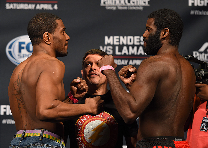 FAIRFAX, VA - APRIL 03: (L-R) Opponents Ron Stallings and Justin Jones face off during the UFC weigh-in at the Patriot Center on April 3, 2015 in Fairfax, Virginia. (Photo by Josh Hedges/Zuffa LLC/Zuffa LLC via Getty Images)