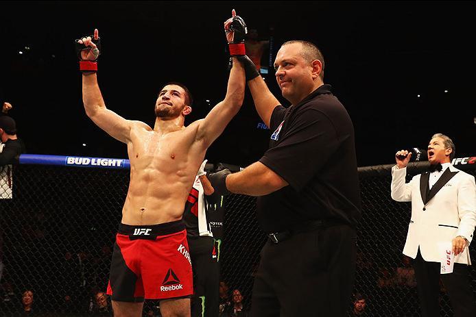 HAMBURG, GERMANY - SEPTEMBER 03: Rustam Khabilov of Russia celebrates his victory over Leandro Silva of Brazil in their Lightweight Bout during the UFC Fight Night held at Barclaycard Arena on September 3, 2016 in Hamburg, Germany. (Photo by Dean Mou