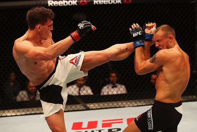 HAMBURG, GERMANY - SEPTEMBER 03: Scott Askham (L) of England kicks facing Jack Hermansson (R) of Sweden in their Middleweight Bout during the UFC Fight Night held at Barclaycard Arena on September 3, 2016 in Hamburg, Germany. (Photo by Dean Mouhtaropoul
