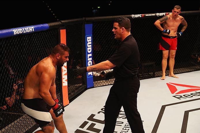 HAMBURG, GERMANY - SEPTEMBER 03: Jarjis Danho (L) of Syria reacts after the punches from Christian Colombo (R) of Denmark in their Heavyweight Bout during the UFC Fight Night held at Barclaycard Arena on September 3, 2016 in Hamburg, Germany. (Photo by