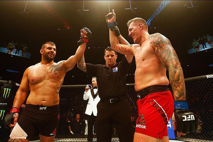 HAMBURG, GERMANY - SEPTEMBER 03: Christian Colombo (R) of Denmark celebrates victory over Jarjis Danho (L) of Syria compete in their Heavyweight Bout during the UFC Fight Night held at Barclaycard Arena on September 3, 2016 in Hamburg, Germany. (Photo b