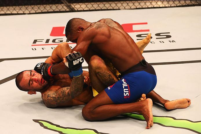 HAMBURG, GERMANY - SEPTEMBER 03: Taylor Lapilus (top) of France controls the body of Leandro Issa (L) of Brazil in their Bantamweight Bout during the UFC Fight Night held at Barclaycard Arena on September 3, 2016 in Hamburg, Germany. (Photo by Dean Mou