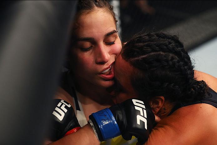 HAMBURG, GERMANY - SEPTEMBER 03: Ashlee Evans-Smith (R) of the USA controls the body of Veronica Macedo (L) of Venezuela in their Womens Bantamweight Bout during the UFC Fight Night held at Barclaycard Arena on September 3, 2016 in Hamburg, Germany. (P