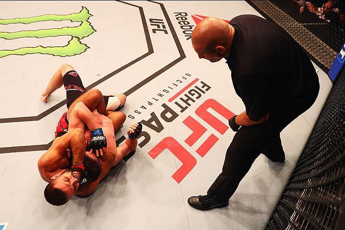HAMBURG, GERMANY - SEPTEMBER 03: Peter Sobotta (L) of Poland controls the body of of Nicolas Dalby (R) of Denmark in their Welterweight Bout during the UFC Fight Night held at Barclaycard Arena on September 3, 2016 in Hamburg, Germany. (Photo by Dean Mo