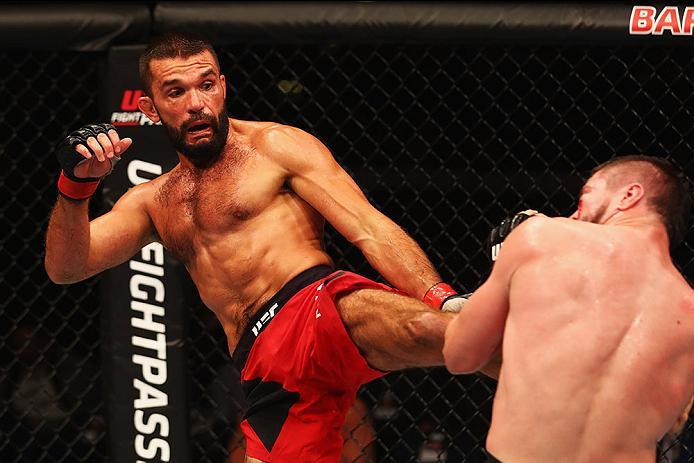 HAMBURG, GERMANY - SEPTEMBER 03: Peter Sobotta of Poland kicks facing Nicolas Dalby (R) of Denmark and compete in their Welterweight Bout during the UFC Fight Night held at Barclaycard Arena on September 3, 2016 in Hamburg, Germany. (Photo by Dean Mouht