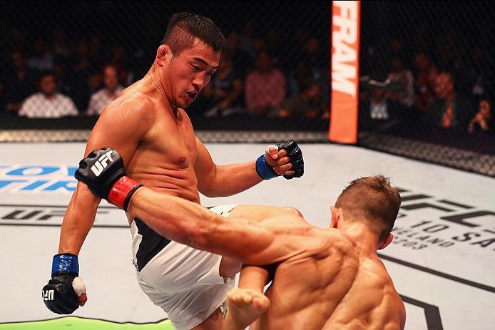 HAMBURG, GERMANY - SEPTEMBER 03: Tae Hyun Bang (L) of South Korea kicks facing Nick Hein (R) of Germany compete in their Lightweight Bout during the UFC Fight Night held at Barclaycard Arena on September 3, 2016 in Hamburg, Germany. (Photo by Dean Mouht