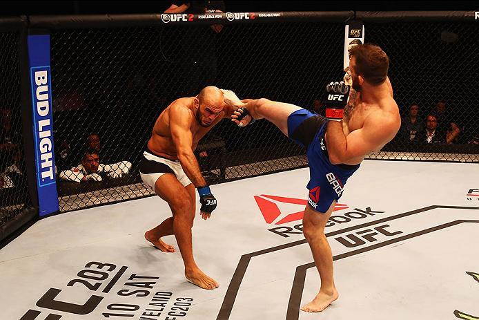 HAMBURG, GERMANY - SEPTEMBER 03: Ryan Bader (R) of the USA kicks facing Ilir Latifi (L) of Sweden compete in their Light Heavyweight Bout during the UFC Fight Night held at Barclaycard Arena on September 3, 2016 in Hamburg, Germany. (Photo by Dean Mouh