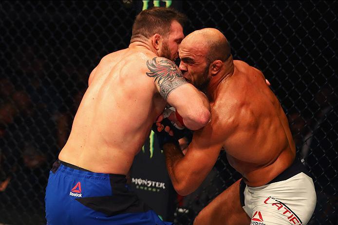 HAMBURG, GERMANY - SEPTEMBER 03: Ilir Latifi (R) of Sweden controls the body of Ryan Bader (L) of the USA compete in their Light Heavyweight Bout during the UFC Fight Night held at Barclaycard Arena on September 3, 2016 in Hamburg, Germany. (Photo by De
