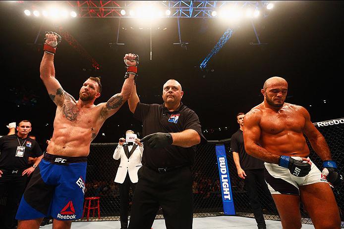 HAMBURG, GERMANY - SEPTEMBER 03: Ryan Bader (L) of the USA celebrates his knockout victory over Ilir Latifi (R) of Sweden after in their Light Heavyweight Bout during the UFC Fight Night held at Barclaycard Arena on September 3, 2016 in Hamburg, Germany.