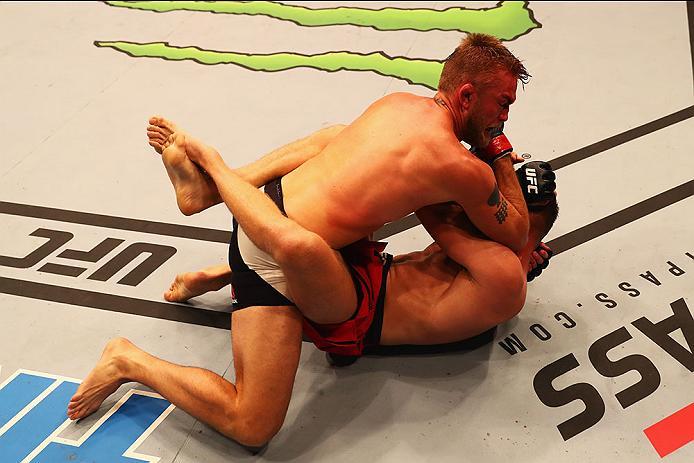 HAMBURG, GERMANY - SEPTEMBER 03: Alexander Gustafsson (top) of Sweden controls the body of Jan Blachowicz (R) of Poland compete in their Light Heavyweight Bout during the UFC Fight Night held at Barclaycard Arena on September 3, 2016 in Hamburg, Germany