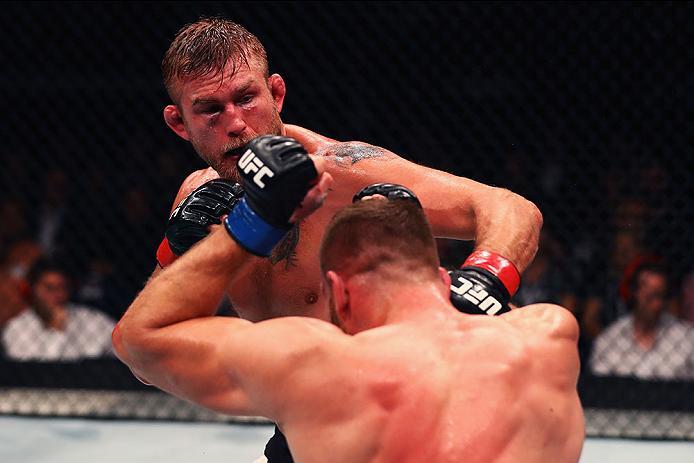 HAMBURG, GERMANY - SEPTEMBER 03: Jan Blachowicz (R) of Poland and Alexander Gustafsson (L) of Sweden compete in their Light Heavyweight Bout during the UFC Fight Night held at Barclaycard Arena on September 3, 2016 in Hamburg, Germany. (Photo by Dean Mo
