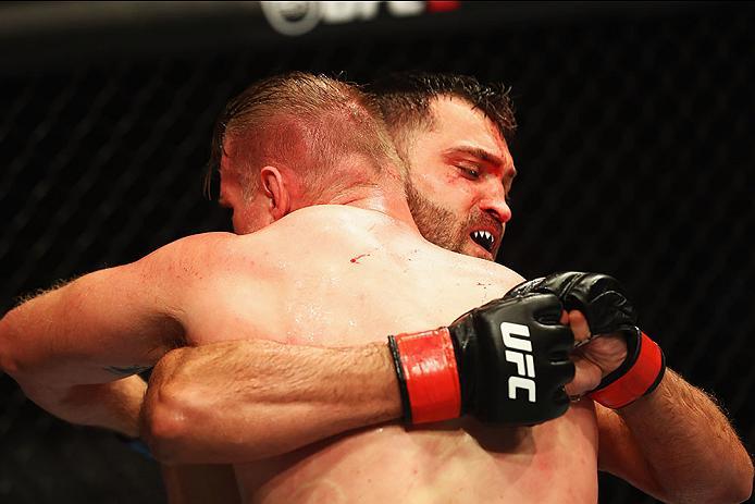 HAMBURG, GERMANY - SEPTEMBER 03: Josh Barnett (L) of USA controls the body of Andrei Arlovski (R) of Belarus compete in their Heavyweight Bout during the UFC Fight Night held at Barclaycard Arena at Barclaycard Arena on September 3, 2016 in Hamburg, Ger