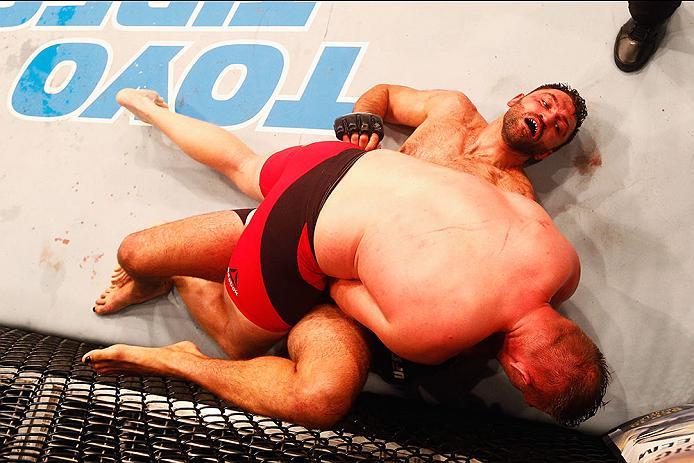 HAMBURG, GERMANY - SEPTEMBER 03: Josh Barnett (top) of USA controls the body of Andrei Arlovski of Belarus compete in their Heavyweight Bout during the UFC Fight Night held at Barclaycard Arena at Barclaycard Arena on September 3, 2016 in Hamburg, Ger