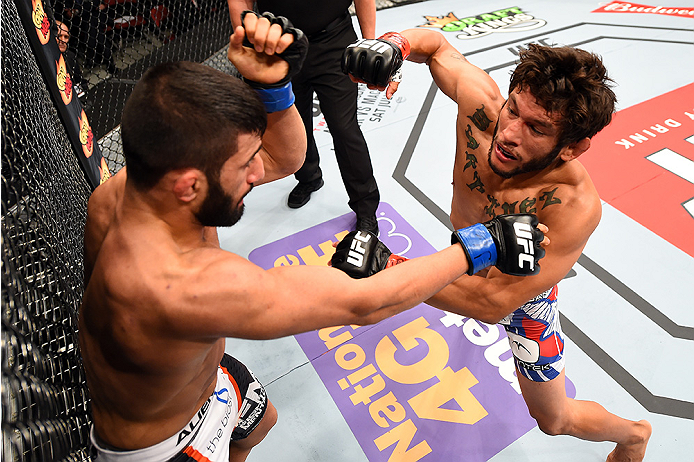 HOLLYWOOD, FL - JUNE 27: (R-L) Danny Martinez punches Sirwan Kakai of Sweden in their bantamweight during the UFC Fight Night event at the Hard Rock Live on June 27, 2015 in Hollywood, Florida. (Photo by Josh Hedges/Zuffa LLC/Zuffa LLC via Getty Images)