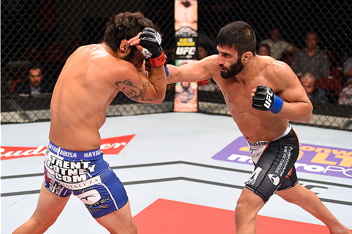 HOLLYWOOD, FL - JUNE 27: (R-L) Sirwan Kakai of Sweden punches Danny Martinez in their bantamweight during the UFC Fight Night event at the Hard Rock Live on June 27, 2015 in Hollywood, Florida. (Photo by Josh Hedges/Zuffa LLC/Zuffa LLC via Getty Images)